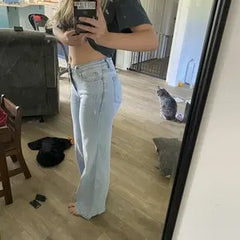 Customer wearing Vintage Blue Sculpt Jeans at home